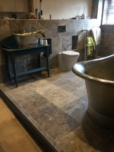 Lewis Deck wet-room floor with Tavertine Tiles