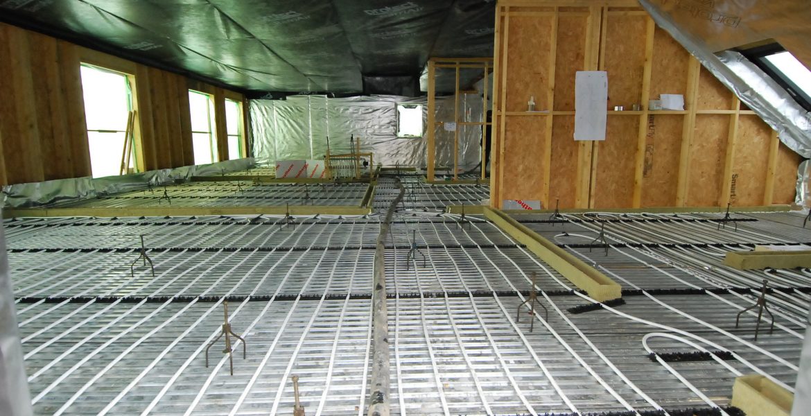 Lewis Plate Underfloor heating metal decking to a timber frame house in Scotland