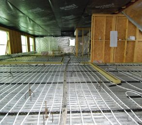 Lewis Plate Underfloor heating metal decking to a timber frame house in Scotland