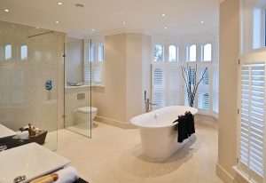 Large format marble tiles in a wet-room bathroom with underfloor heating upstairs on Lewis Deck