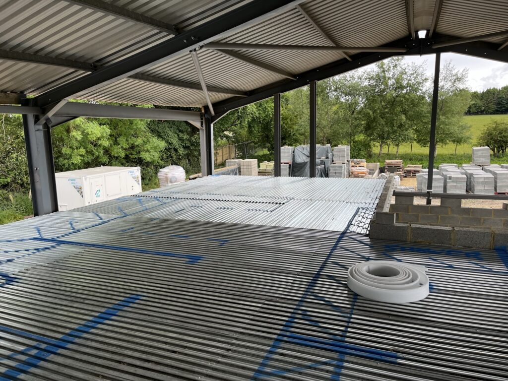 Lewis Deck with walls marked out for the underfloor heating zones