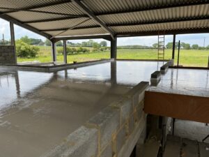 Liquid screed on underfloor heating on Lewis Deck upstairs in a New Build Barn Conversion